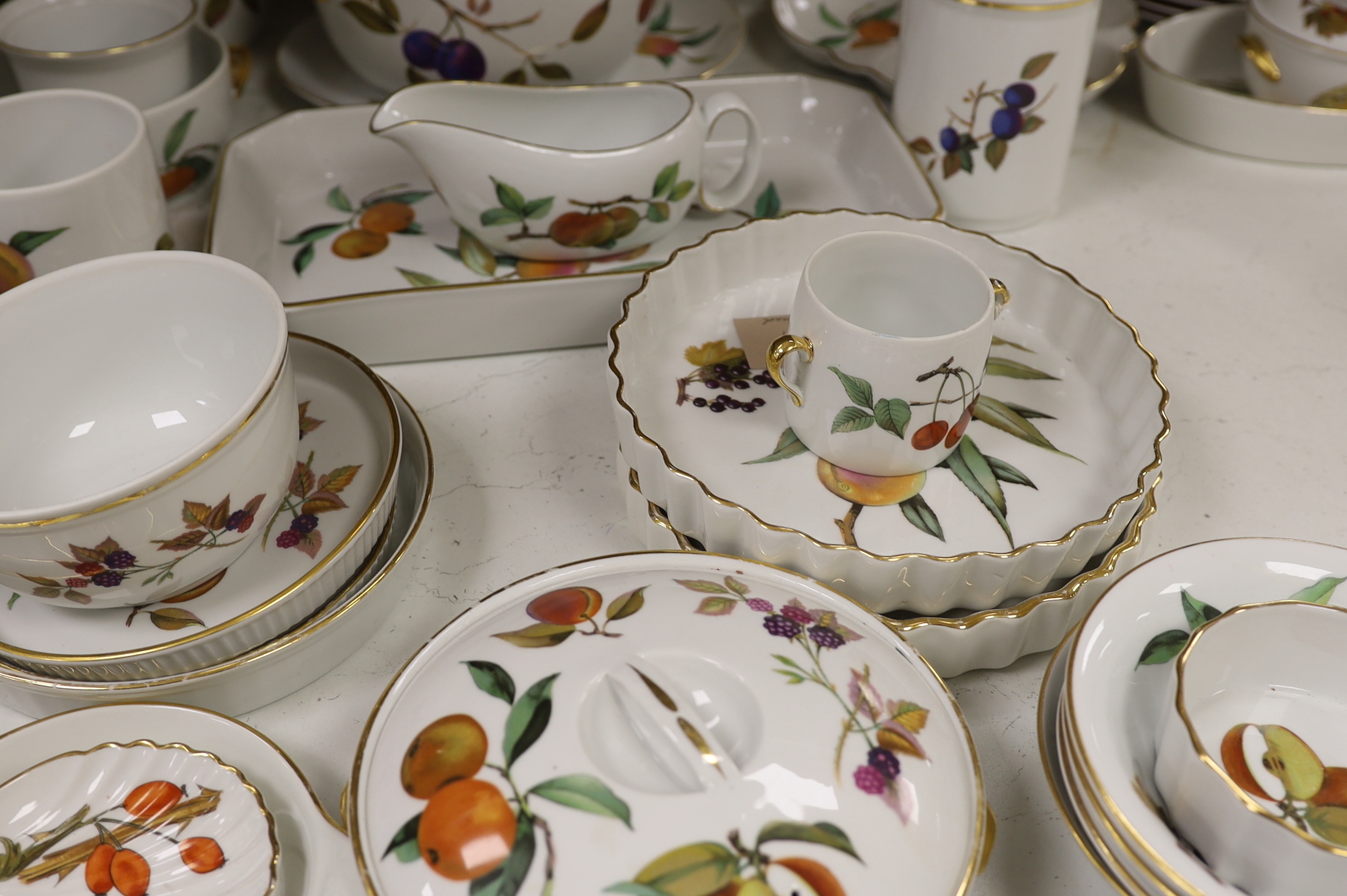 A large quantity of Worcester Evesham dinnerware, including; plates, bowls, serving dishes, jugs, flan, dishes, etc. (70 pieces)